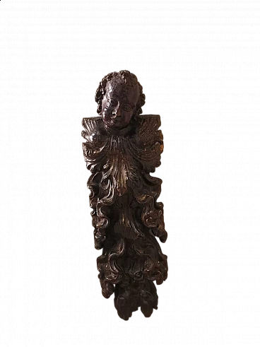 Walnut decorative putto sculpture, 17th century