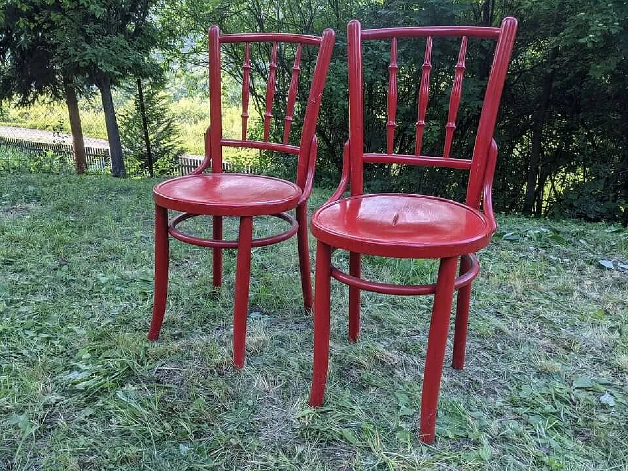 Pair of red-stained beech bistro chairs by Lichtig, early 20th century 1