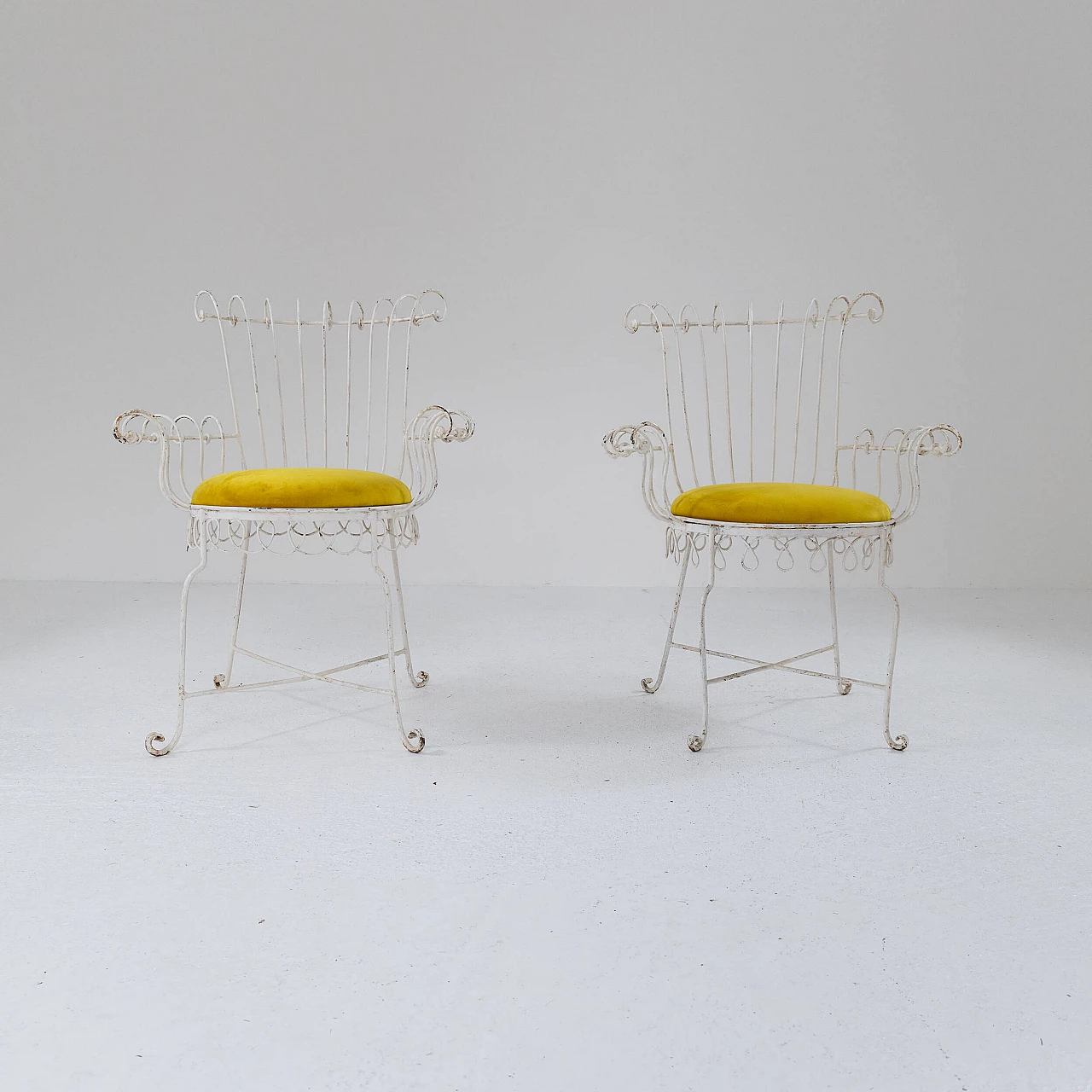Pair of iron and yellow velvet chairs, 1950s 1