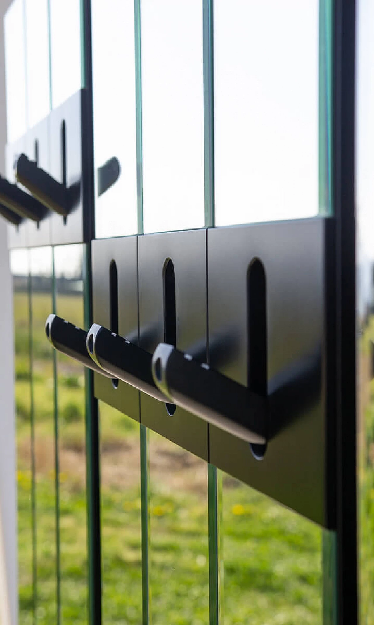Wall-mounted three-module mirrored clothes stand, 1970s 4