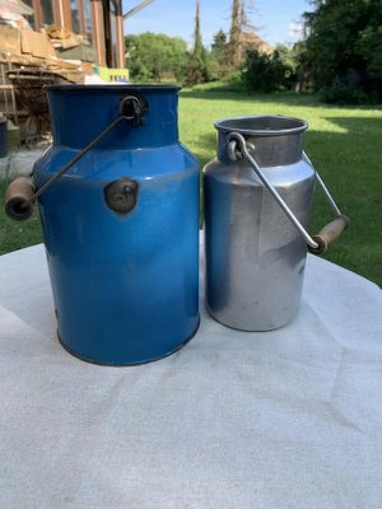 Pair of metal milk cans, 1950s 1