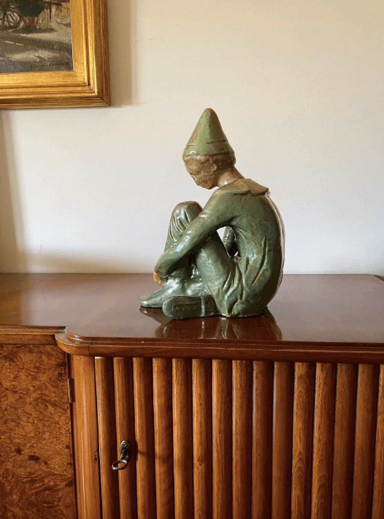 Giordano Tronconi, Seated boy, green ceramic figure from Faenza, 1950s 51