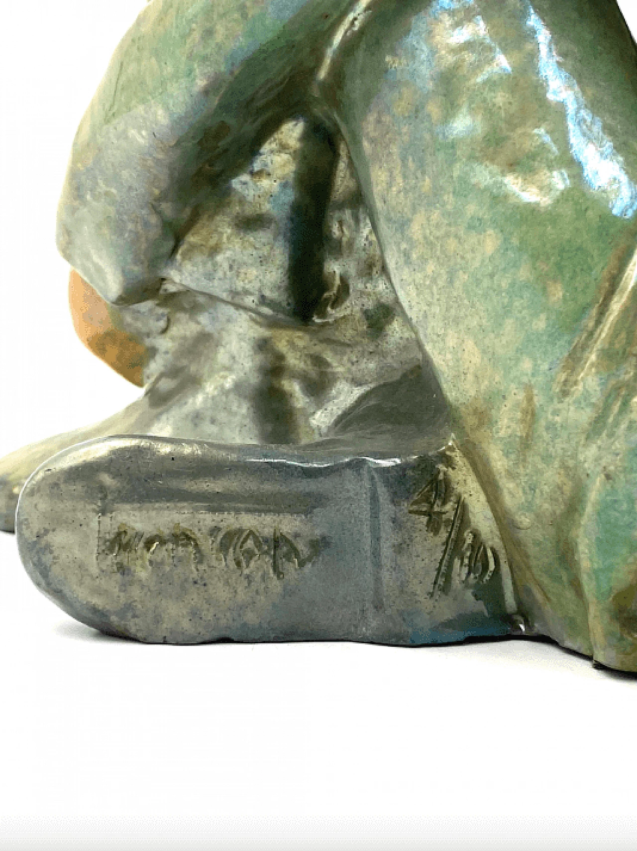 Giordano Tronconi, Seated boy, green ceramic figure from Faenza, 1950s 67