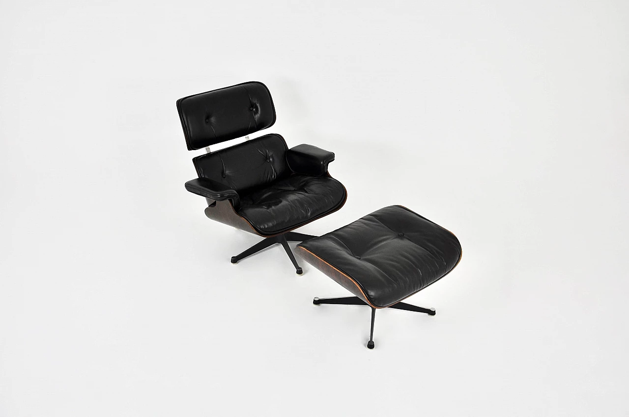 Black leather and wood armchair with ottoman by Charles and Ray Eames for ICF, 1970s 2