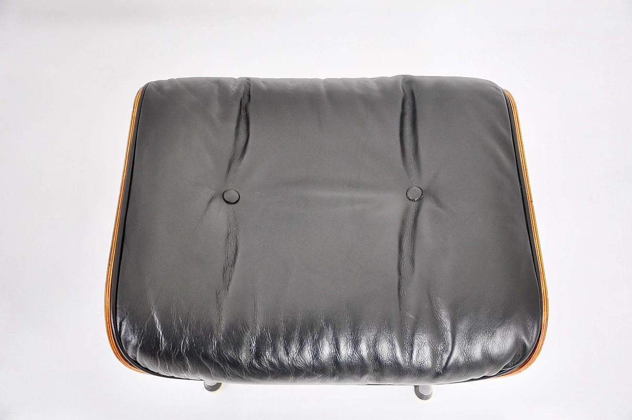 Black leather and wood armchair with ottoman by Charles and Ray Eames for ICF, 1970s 8