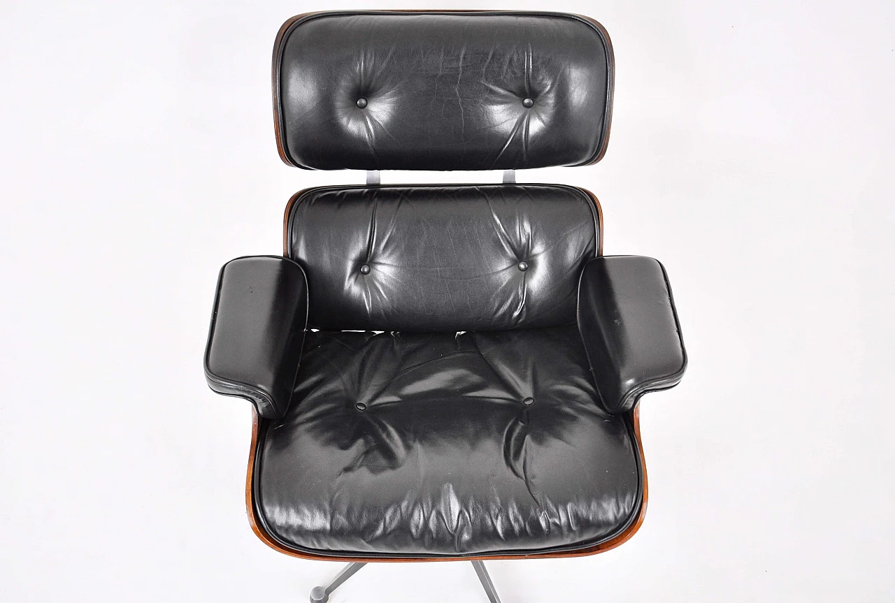 Black leather and wood armchair with ottoman by Charles and Ray Eames for ICF, 1970s 9