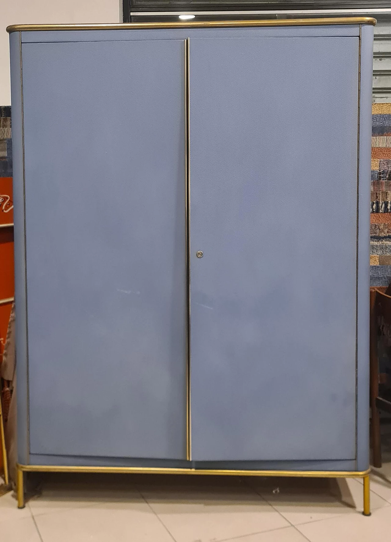 Light blue skai wardrobe with gilded metal borders, 1960s 2