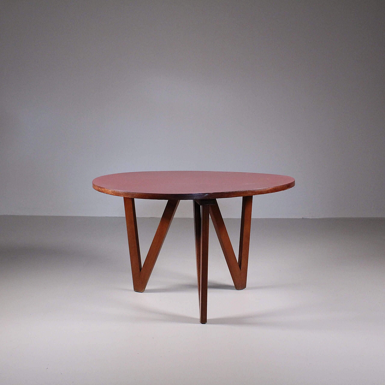 Round wood coffee table with red top, 1970s 4