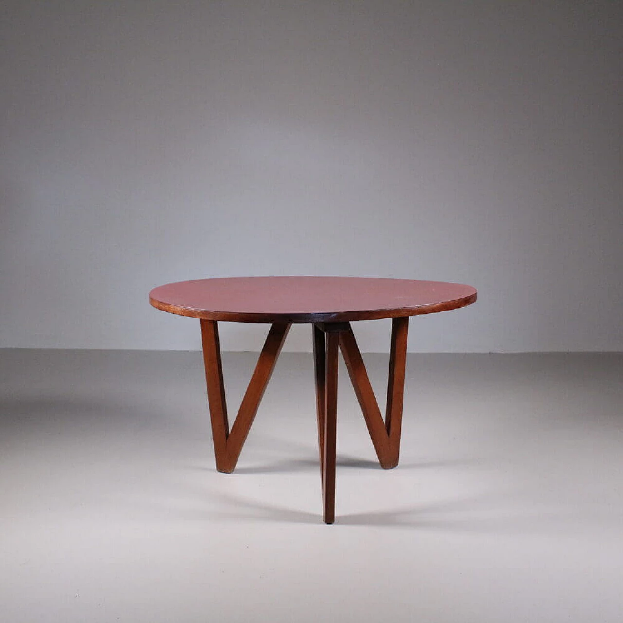 Round wood coffee table with red top, 1970s 5