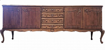 Dark stained national walnut sideboard with carvings, 1940s