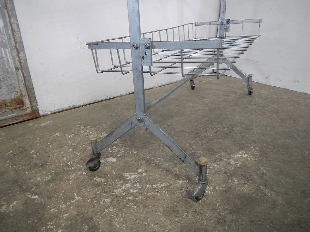 Iron store display stand with wheels, 1960s 9
