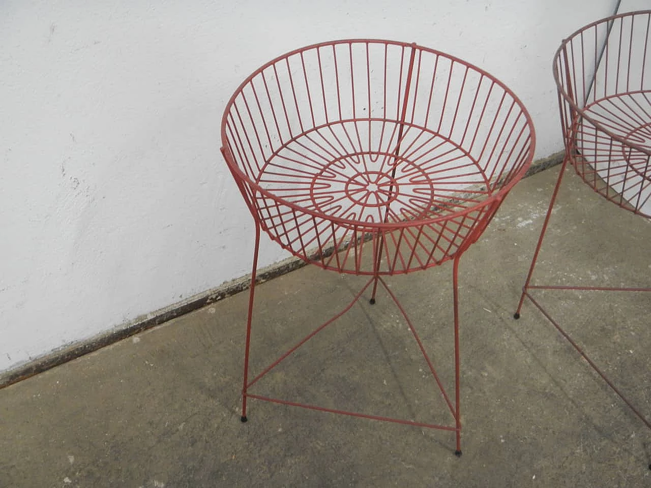 Pair of red plastic-coated metal display baskets, 1960s 4