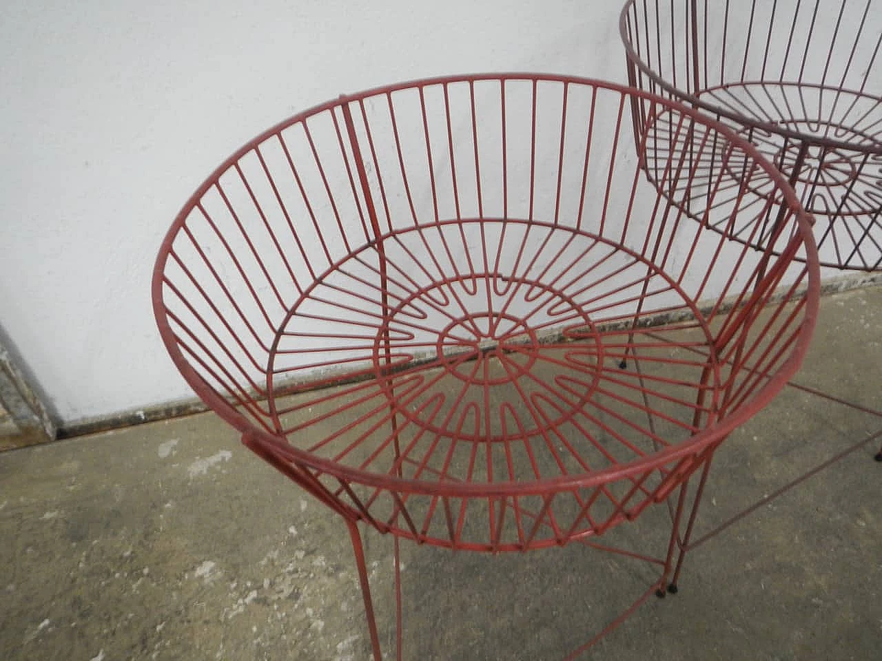 Pair of red plastic-coated metal display baskets, 1960s 6