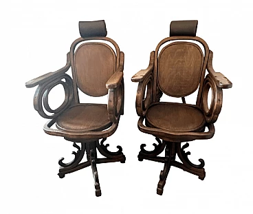 Pair of Art Nouveau barber swivel armchairs, early 20th century