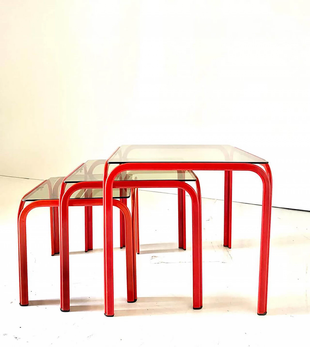 Trio of nesting tables in iron and smoked glass, 1980s 1