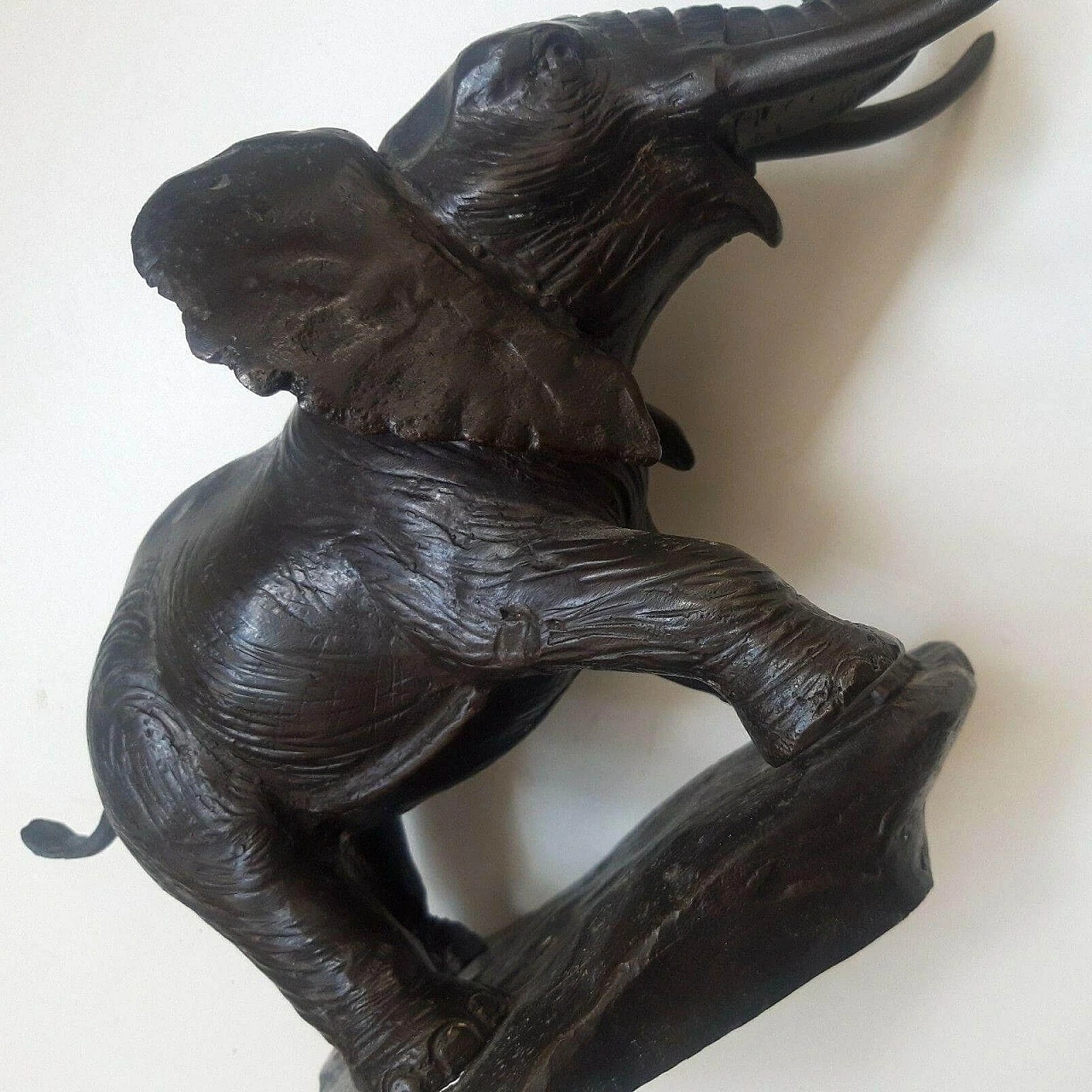 Bronze elephant with flower candlestick, 1970s 12