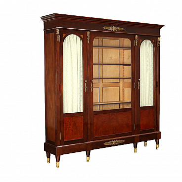 Wood bookcase with glass doors and gilded metal details