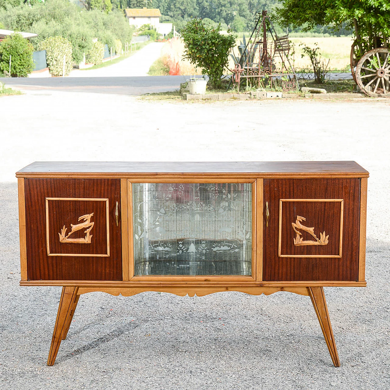 Glass and two-tone wood bar cabinet with carved deer, 1960s 1