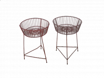 Pair of red plastic-coated metal display baskets, 1960s