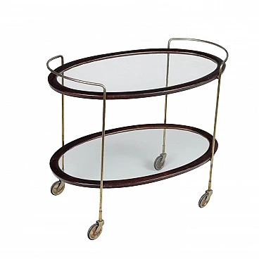 Oval ebony-stained wood and glass bar cart, 1950s