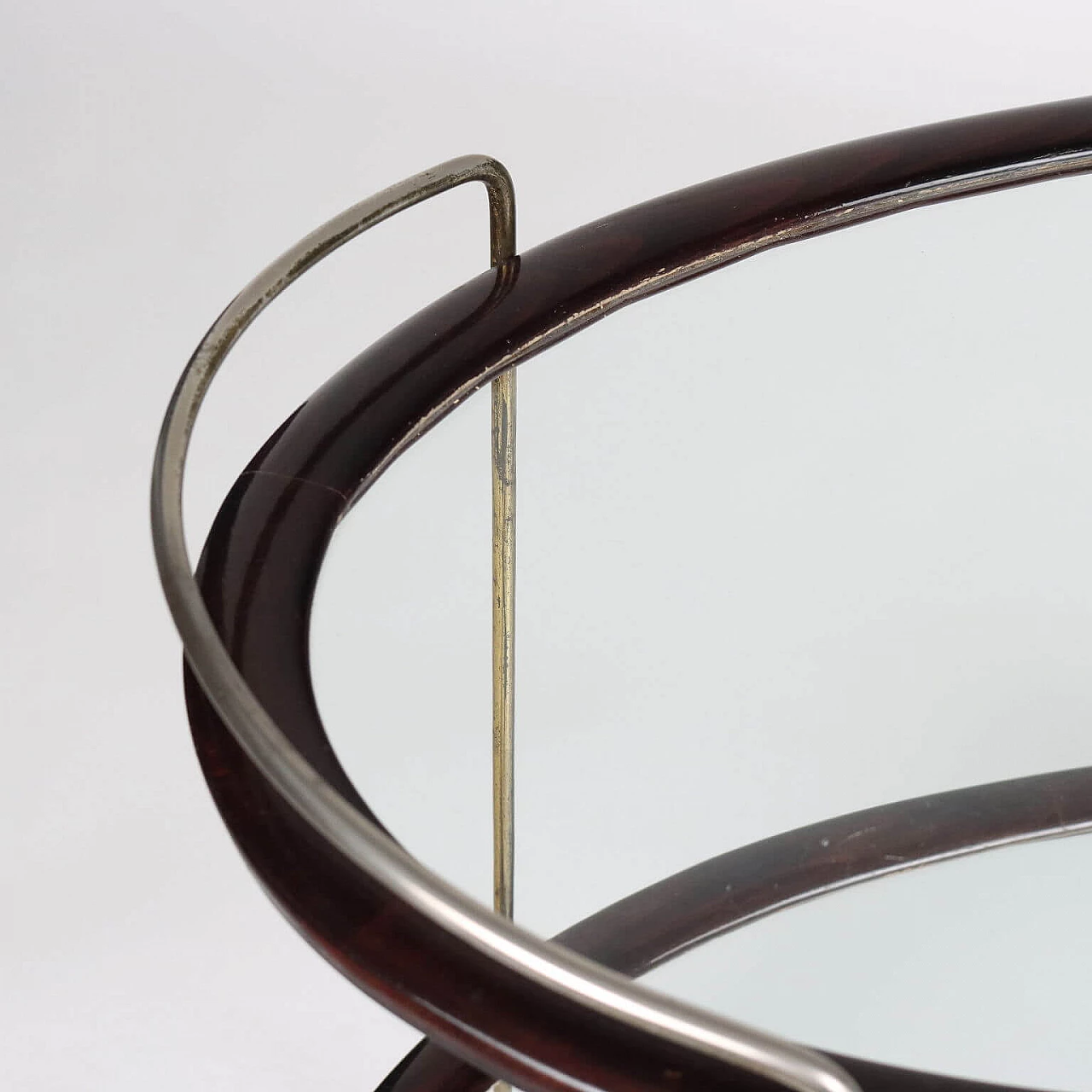 Oval ebony-stained wood and glass bar cart, 1950s 4