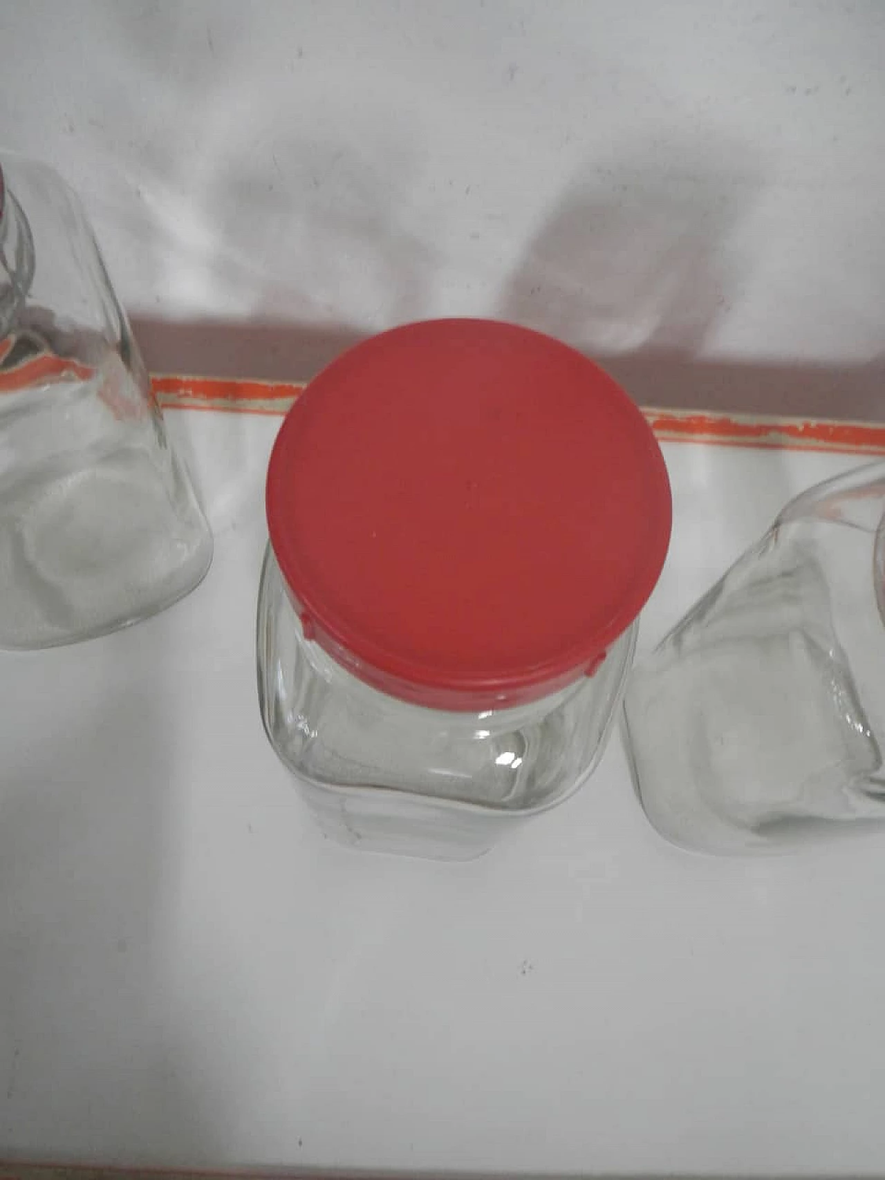 3 Glass store jars with red plastic caps, 1970s 4