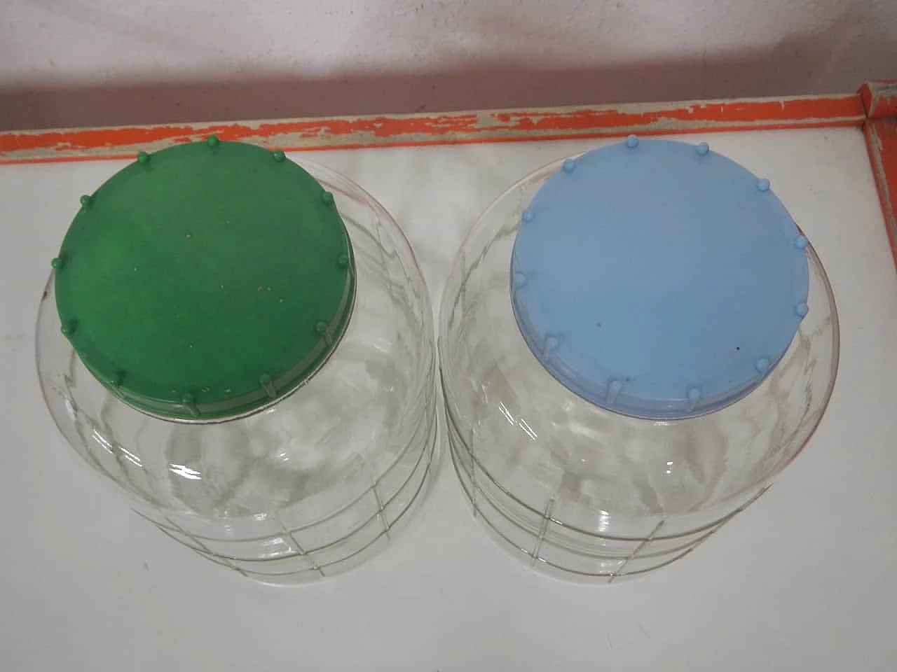 Pair of glass store jars with plastic caps, 1970s 2