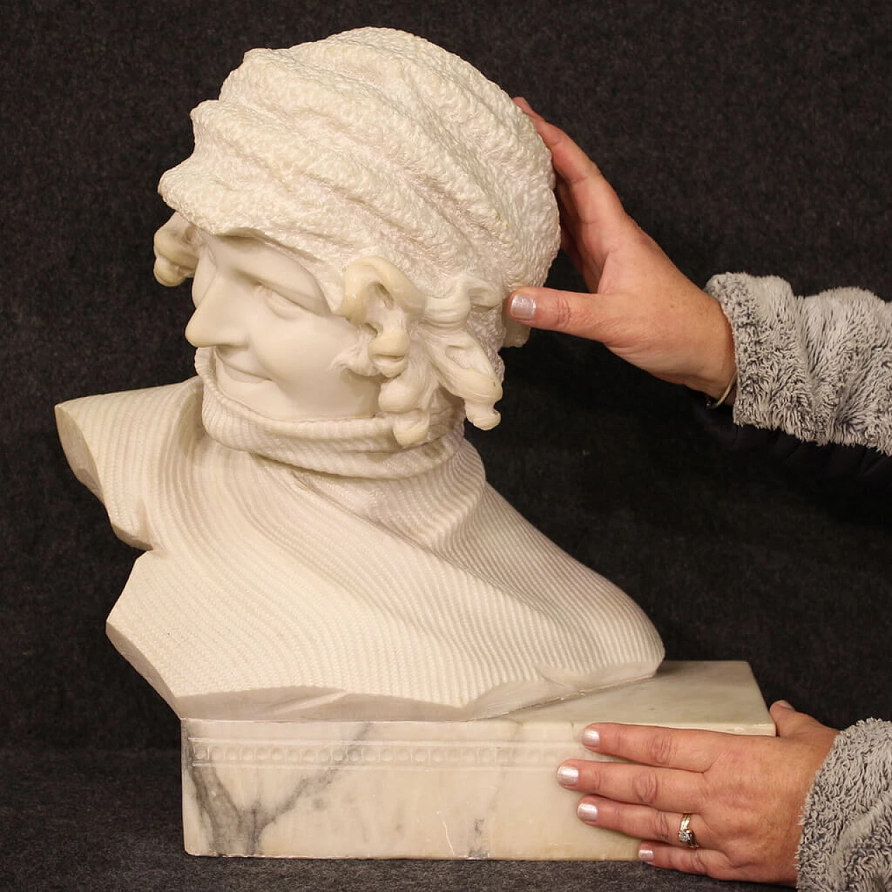 Marble sculpture of girl with hat and turtleneck 2