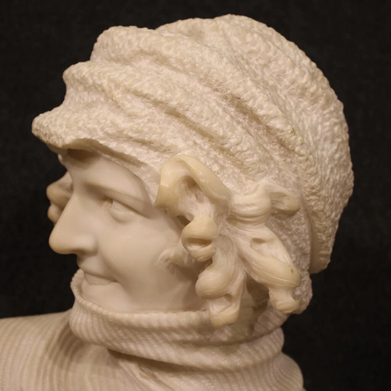 Marble sculpture of girl with hat and turtleneck 4