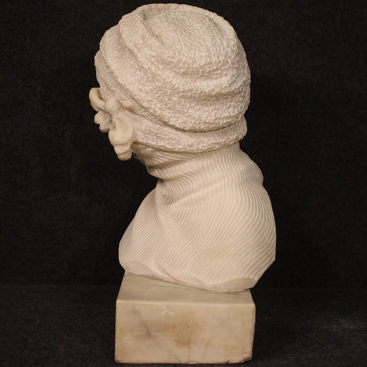 Marble sculpture of girl with hat and turtleneck 6