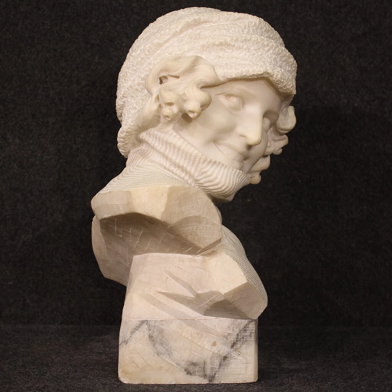 Marble sculpture of girl with hat and turtleneck 9