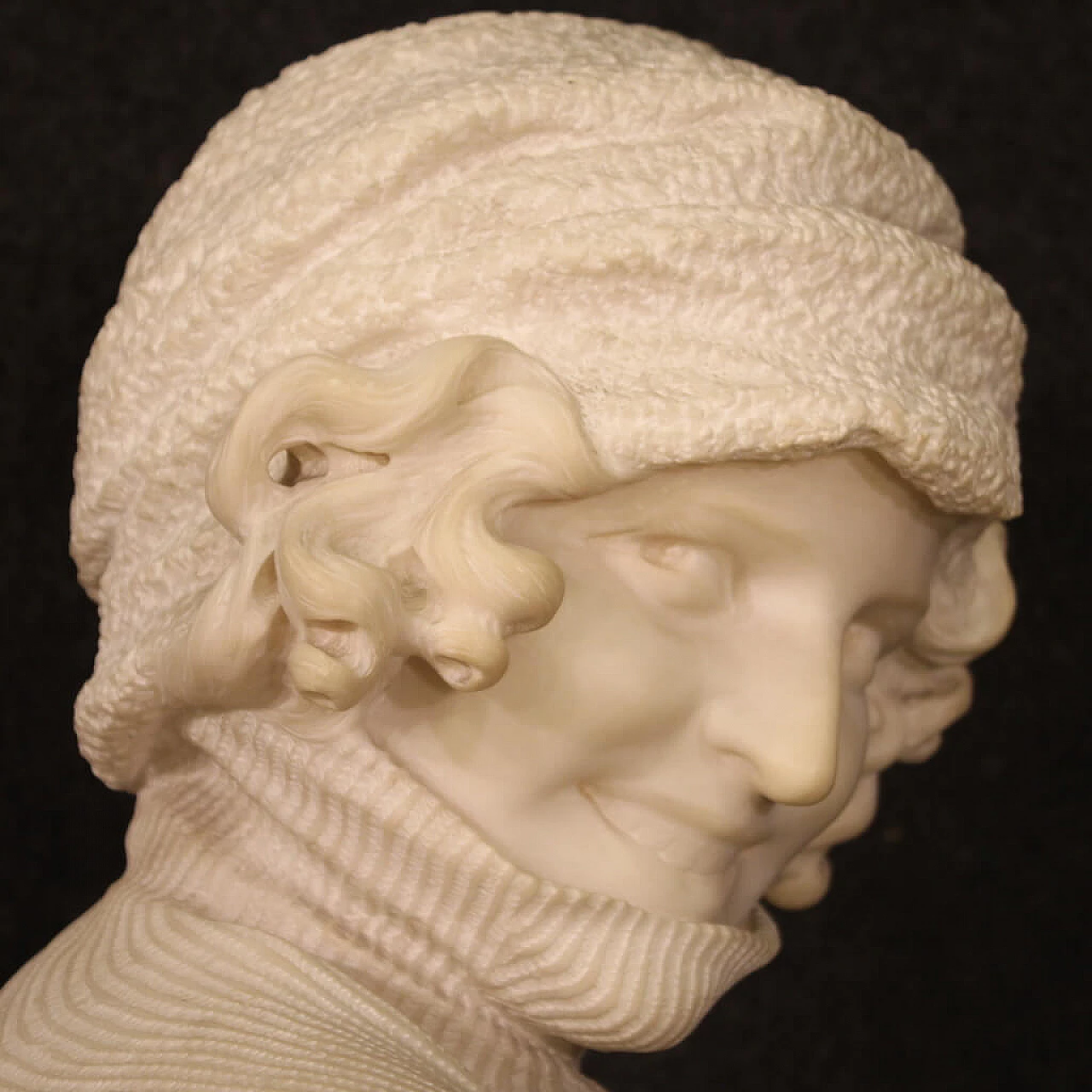 Marble sculpture of girl with hat and turtleneck 11