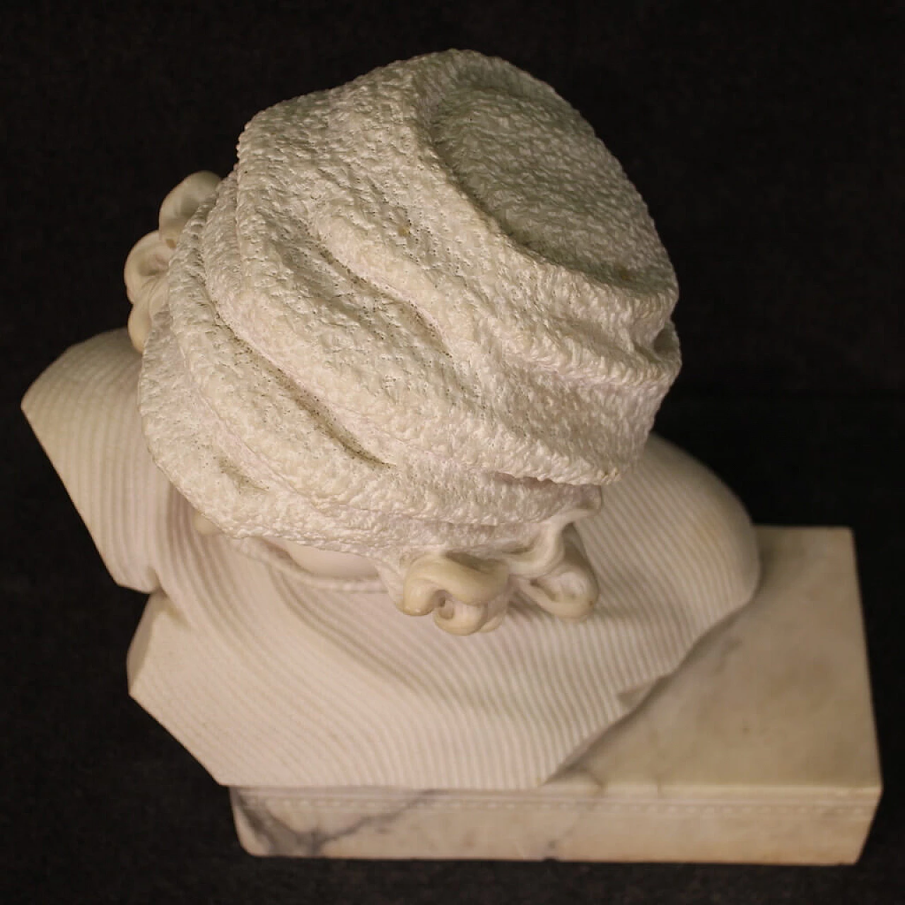 Marble sculpture of girl with hat and turtleneck 12