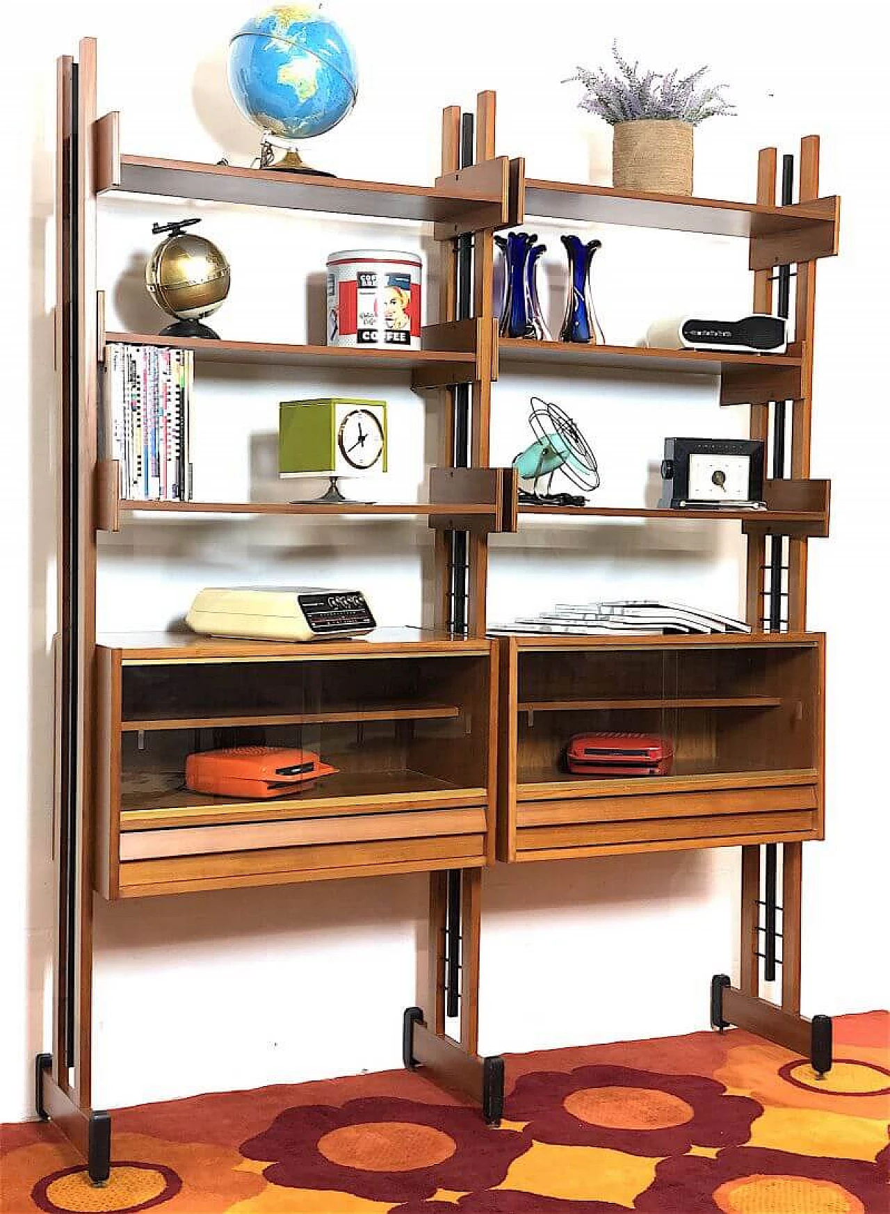Two-bay teak bookcase with wooden and metal uprights, 1960s 1