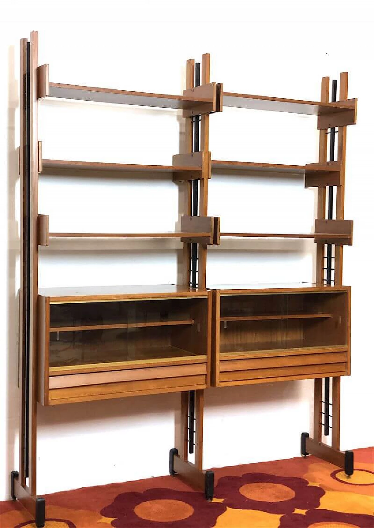 Two-bay teak bookcase with wooden and metal uprights, 1960s 4