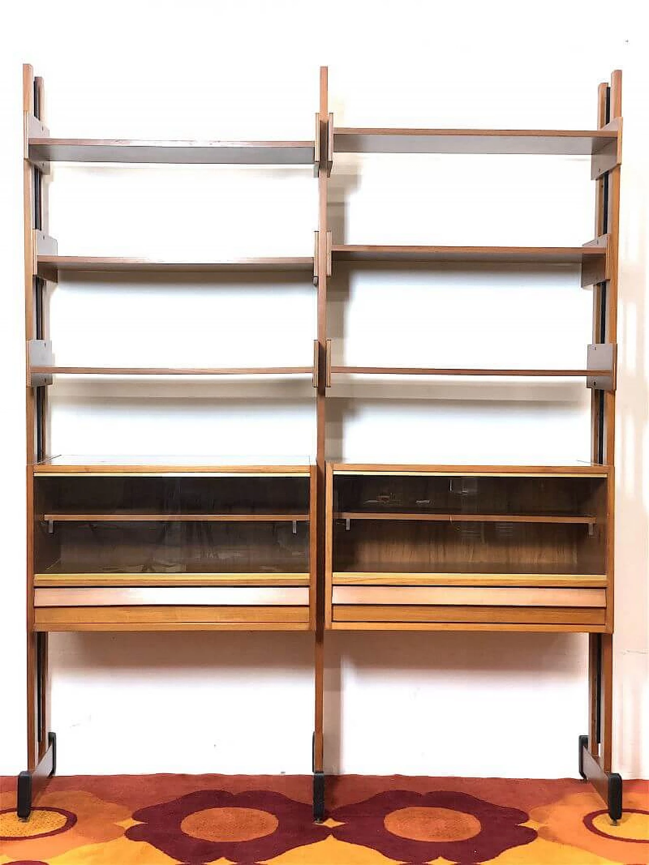 Two-bay teak bookcase with wooden and metal uprights, 1960s 5