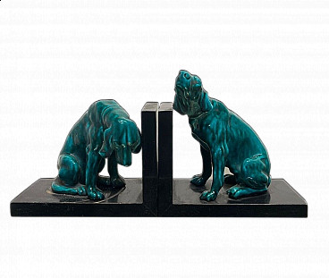Pair of wood and glazed ceramic bookends with dogs