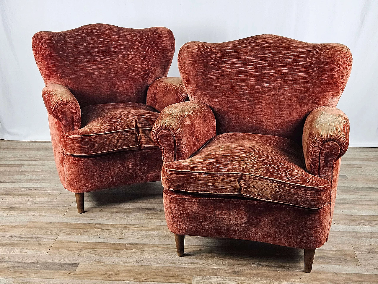 Pair of wood and red fabric armchairs, 1950s 1