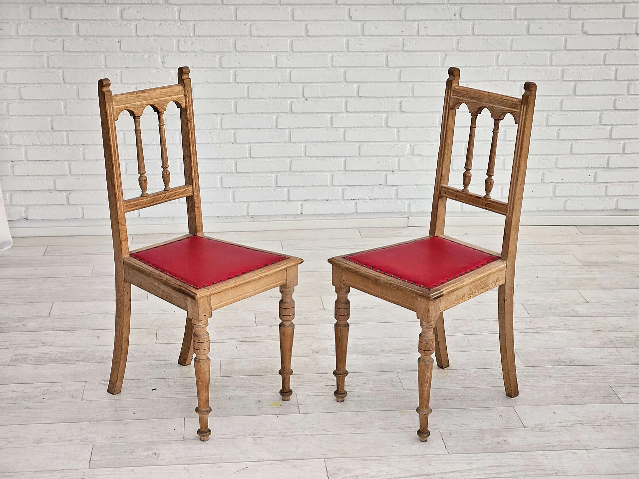 Pair of Danish oak and leather chairs, 1950s 1