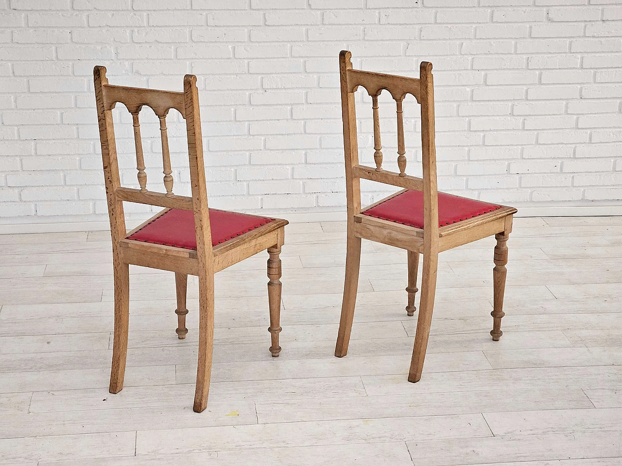 Pair of Danish oak and leather chairs, 1950s 11