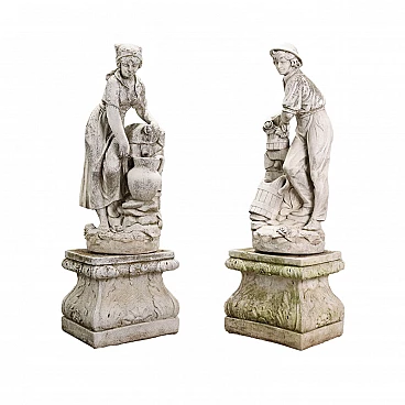 Pair of gritstone statues of peasants, early 20th century