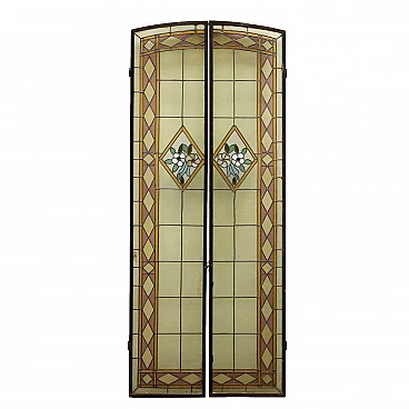 Pair of Art Nouveau glass windows in colored leaded glass, early 20th century