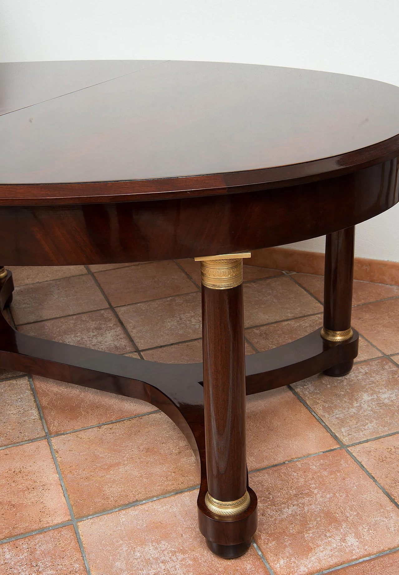 Empire style mahogany feather and bronze extendable table, early 20th century 2