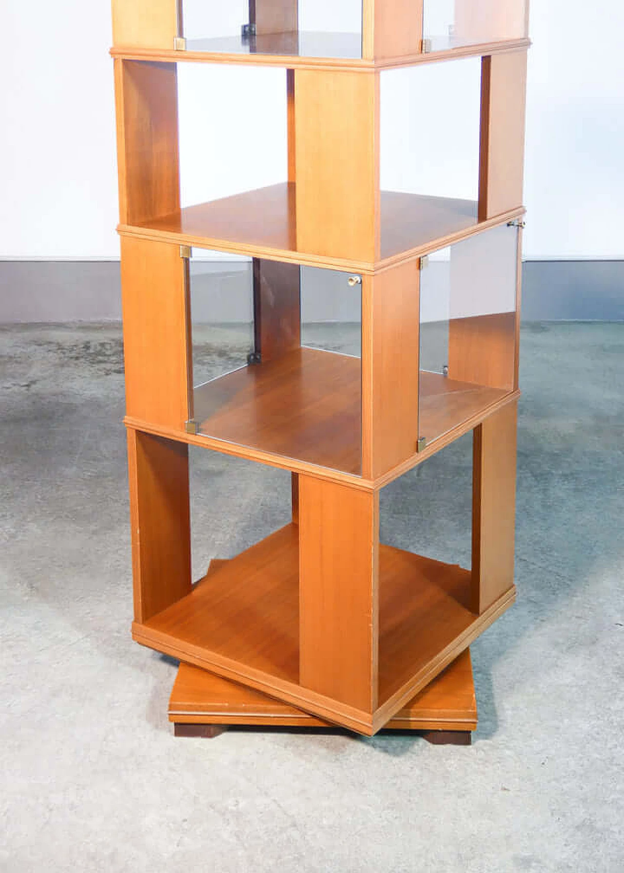 Veneered wood and glass revolving bookcase, 1960s 9