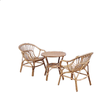 Pair of armchairs and small round table in bamboo and rattan, 1960s