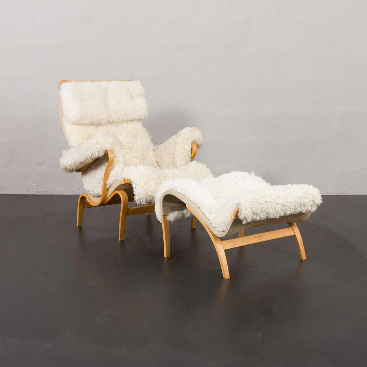 Sheepskin footstool Pernilla armchair with by Bruno Mathsson, 1960s 1