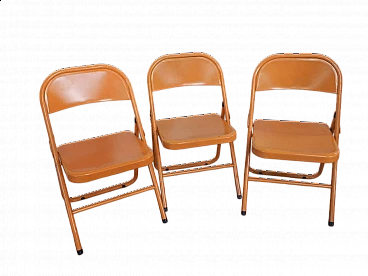 3 Folding chairs in orange metal, 1970s