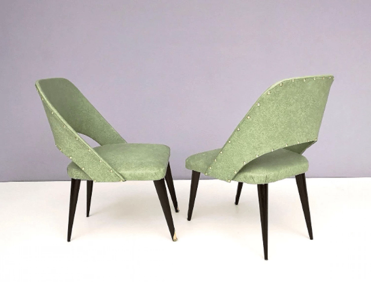Pair of ebonized wood and green skai chairs, 1950s 4