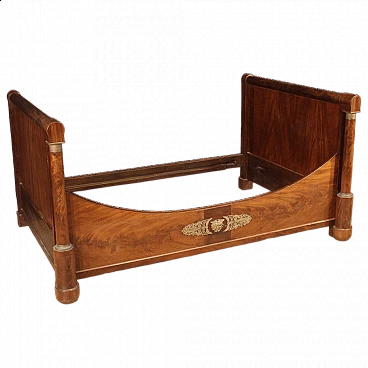 Empire wood bed with bronze and brass decorations, 19th century