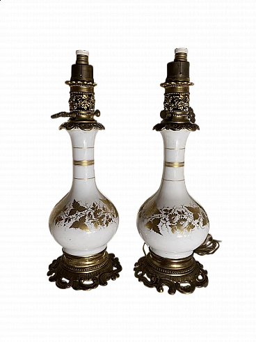 Pair of bronze and white ceramic table lamps, late 19th century